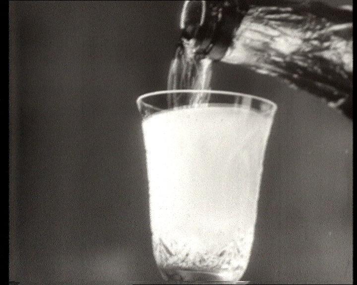 Our collection includes rare footage that showcases the popularity of Sovetskoye Shampanskoye, a brand of fizzy wine produced in the Soviet Union and considered a must-have for New Year parties. Despite the restrictions imposed by the Soviet "shortage economy," our footage shows Soviet citizens eagerly purchasing and enjoying this coveted beverage during the holiday season. This footage provides a unique glimpse into Soviet culture and traditions, and can be used to enhance any project related to the Soviet Union or the Cold War era.