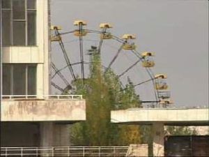 Abandoned amusement park – The iconic Ferris wheel and bumper cars, rusted and silent.
