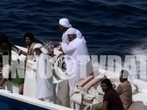 Local men travel by small motorboat in the Persian Gulf / Strait of Hormuz region, 1987. The archival news footage shows passengers and boat crew in traditional dress moving across open water during a sequence connected to Gulf maritime traffic and oil tanker routes.