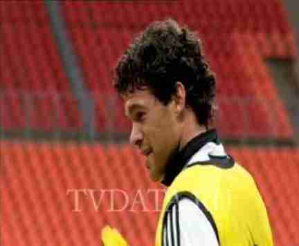 Chelsea player in a yellow training bib in front of the red stands at Luzhniki Stadium, Moscow, May 2008